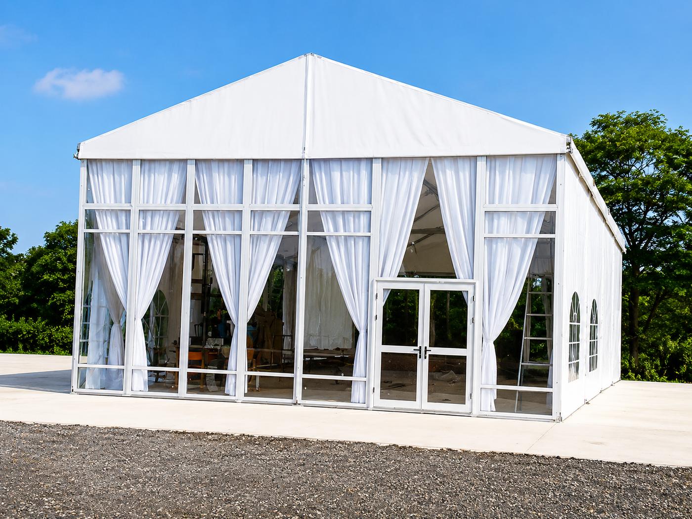 Glass tent with curtains